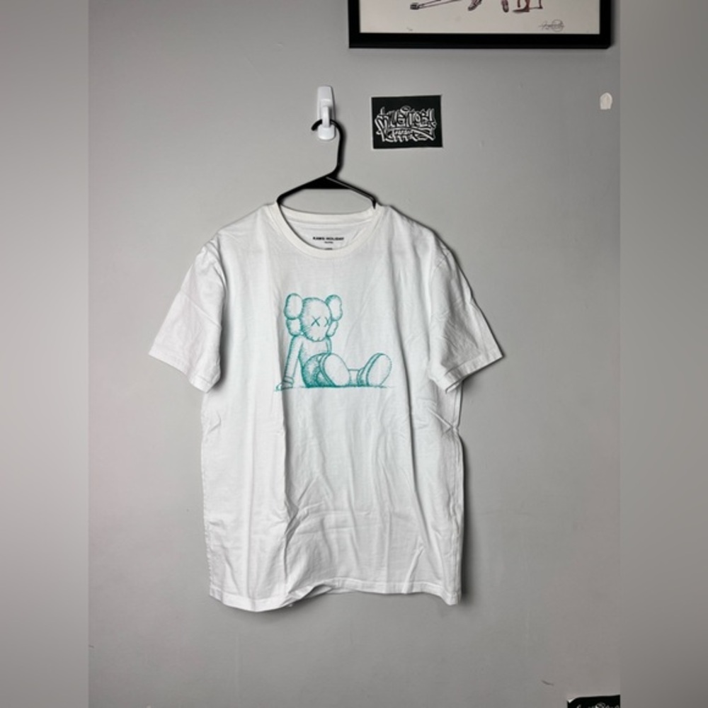 Kaws Holiday Tee